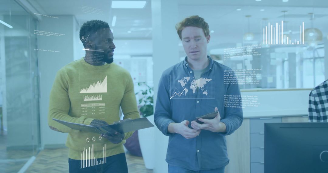 Diverse Business Colleagues Analyzing Digital Data and Graphs