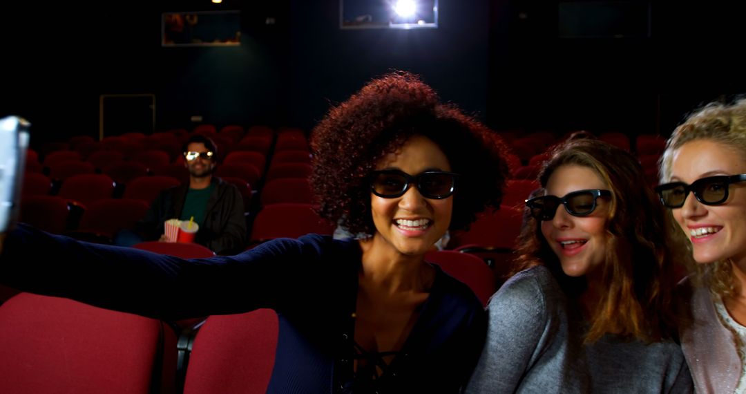 Friends Taking Selfie in Movie Theater Wearing 3D Glasses - Free Images, Stock Photos and Pictures on Pikwizard.com