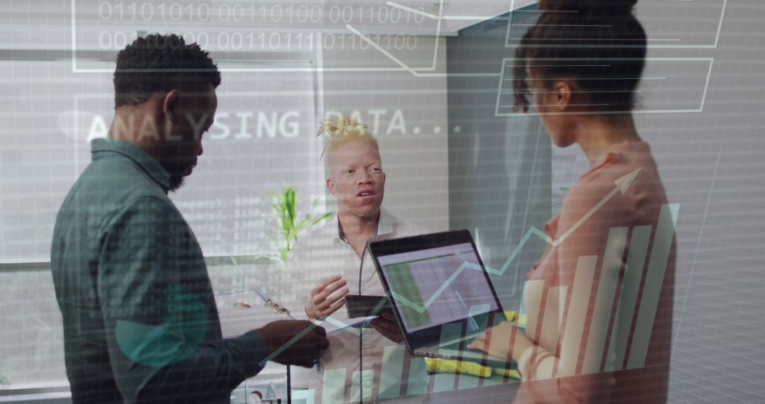 Team Analyzing Business Data in Modern Office