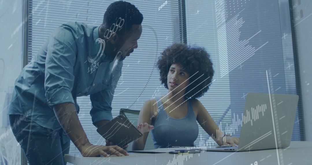 Innovative Business Team Discussing Data Insights in Modern Office