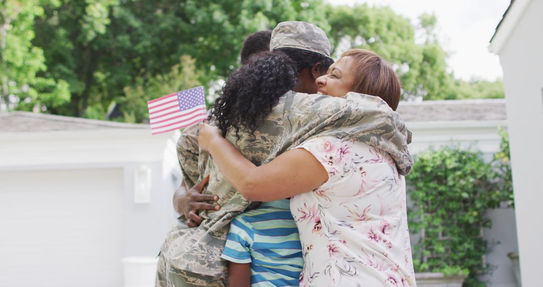 Image of african american family welcoming soldier mother after returning home - Free Images, Stock Photos and Pictures on Pikwizard.com