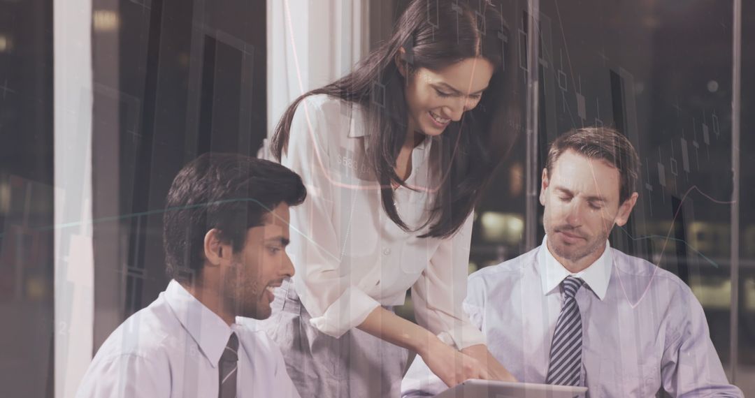 Diverse Team Collaborating on Business Analytics at Office