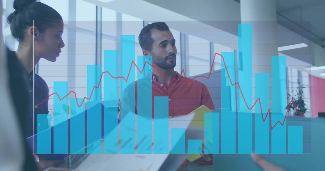 Business Professionals Analyzing Graph in Modern Office Environment