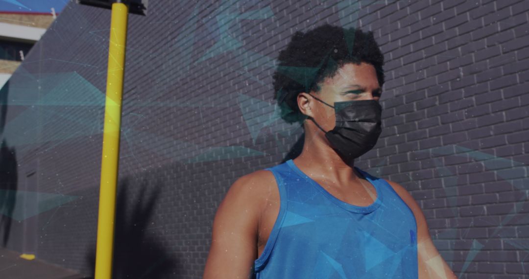 African American Athlete in Mask Experiencing Networking Concept