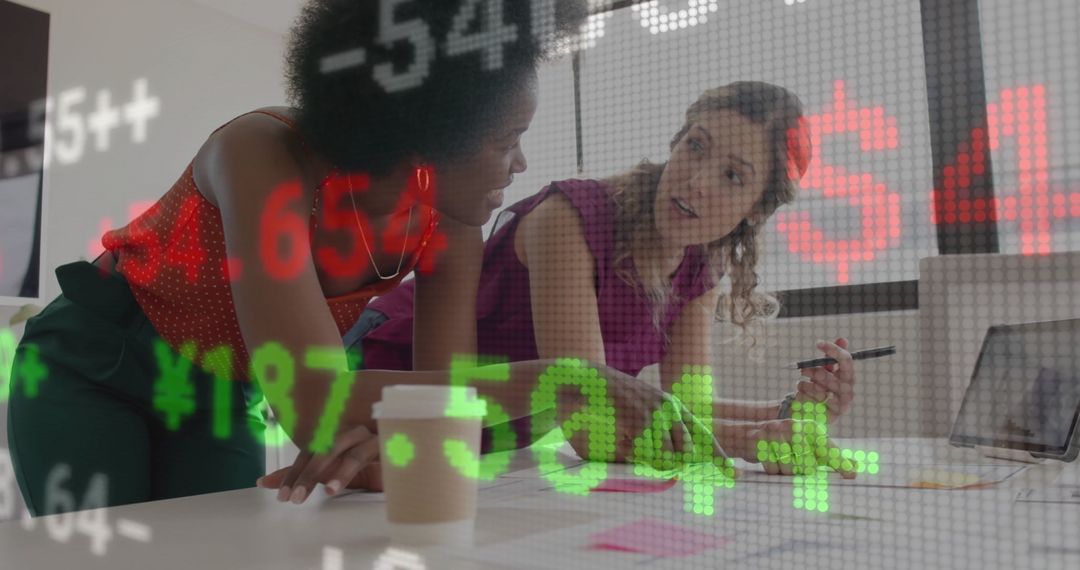 Team Analyzing Financial Data System in Modern Office Setting