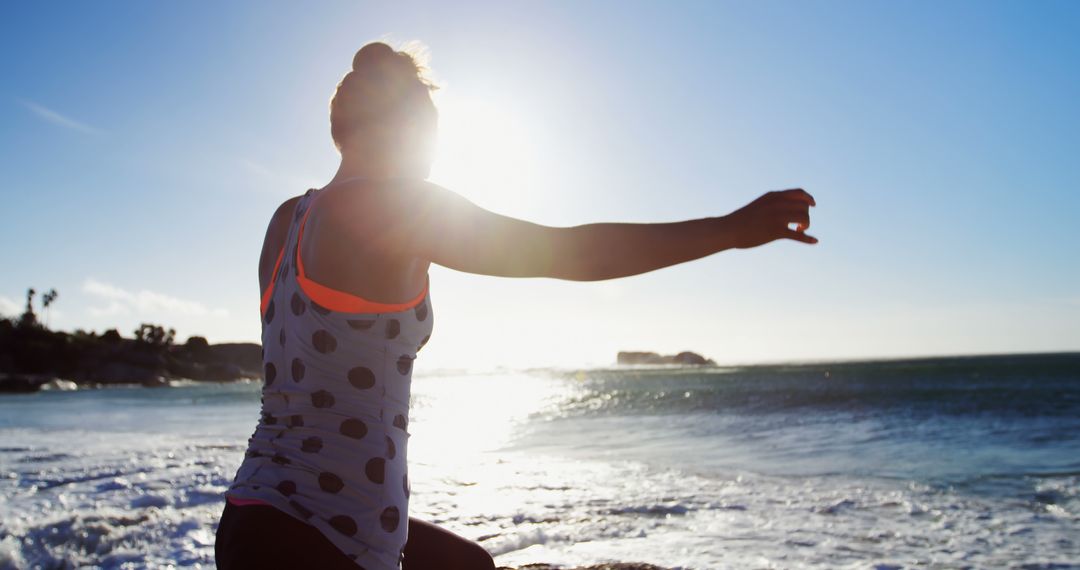 Woman Practicing Yoga by Beach at Sunrise - Free Images, Stock Photos and Pictures on Pikwizard.com