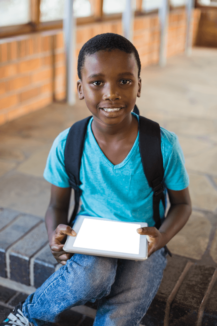 Young Student with Tablet Smiling Outdoors Transparent Screen