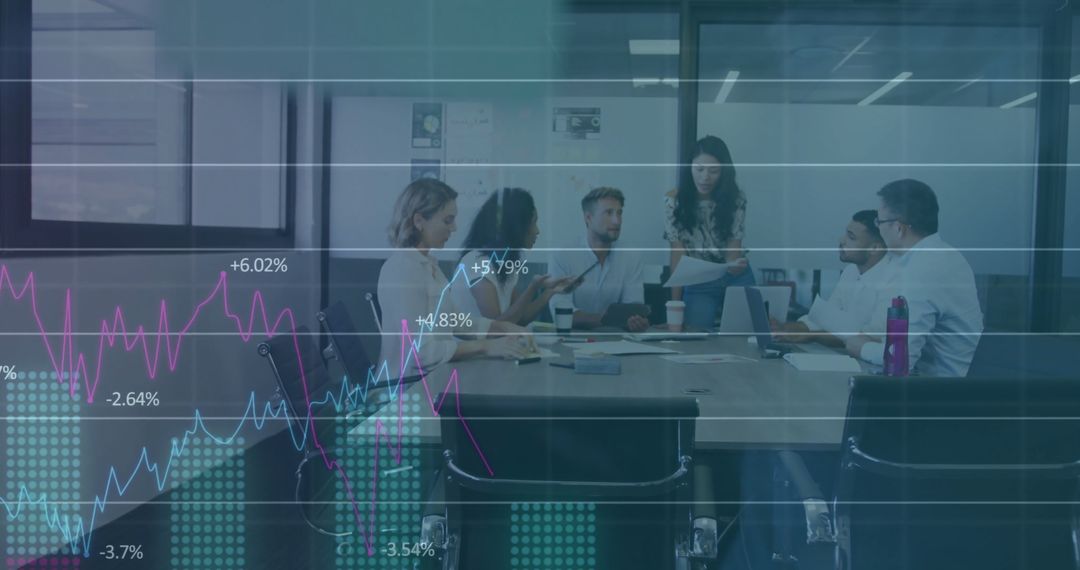 Diverse Business Team Analyzing Financial Growth Data in Modern Office