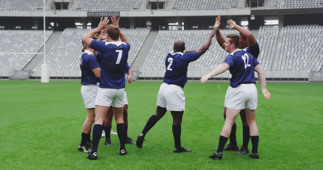 Rugby Team Celebrating Victory with High Fives - Free Images, Stock Photos and Pictures on Pikwizard.com