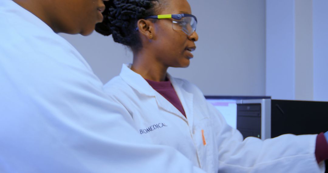 African Female Scientists Collaborating in Laboratory - Free Images, Stock Photos and Pictures on Pikwizard.com