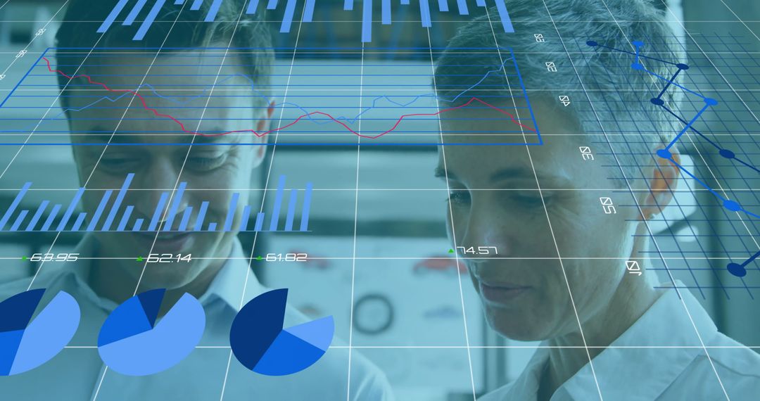 Business Coworkers Analyzing Growth Graphics with Technology