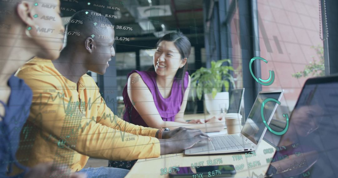 Diverse Team Collaborating with Financial Data Analysis in Modern Office