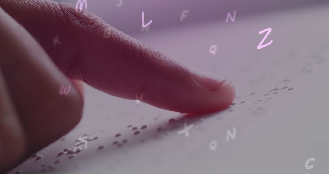 Finger Reading Braille with Floating Alphabets Overlay - Free Images, Stock Photos and Pictures on Pikwizard.com