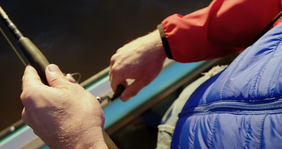 Close-up of Person Fishing with Rod on Boat - Free Images, Stock Photos and Pictures on Pikwizard.com