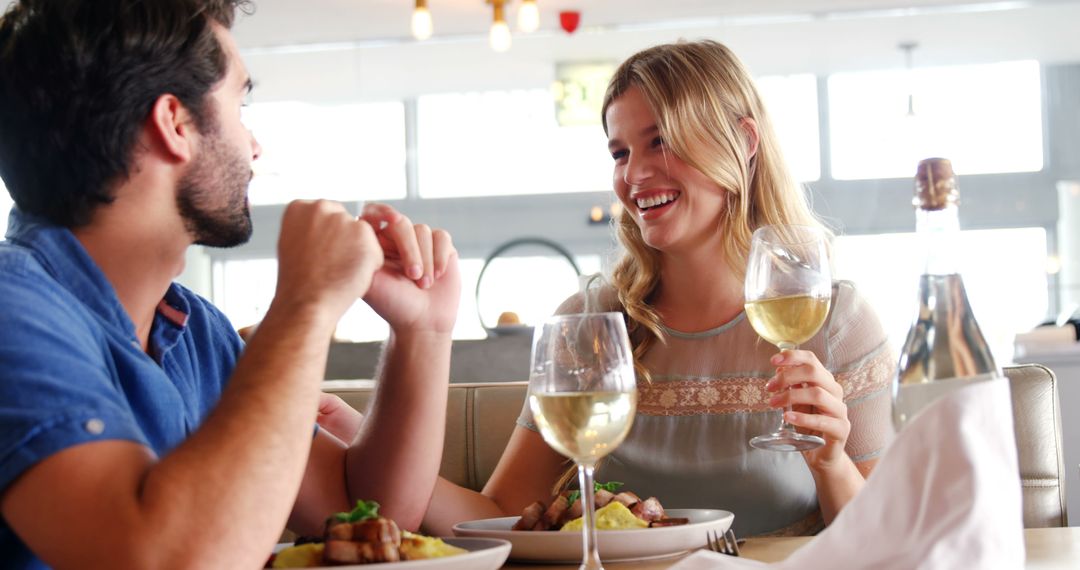 Couple Enjoying Romantic Dinner Together - Free Images, Stock Photos and Pictures on Pikwizard.com