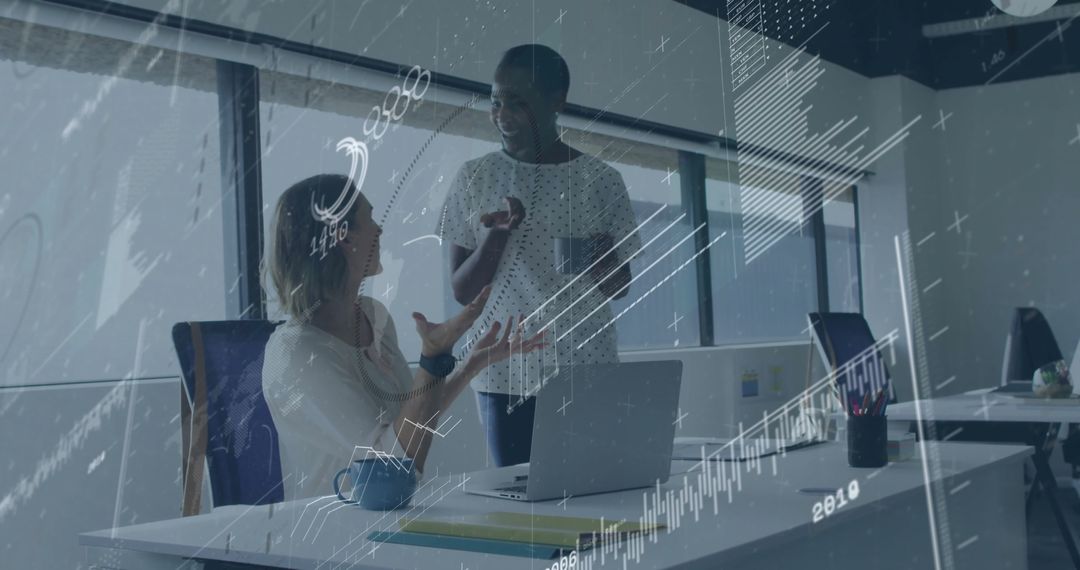 Two Women Collaborating in Office Environment with Digital Overlay