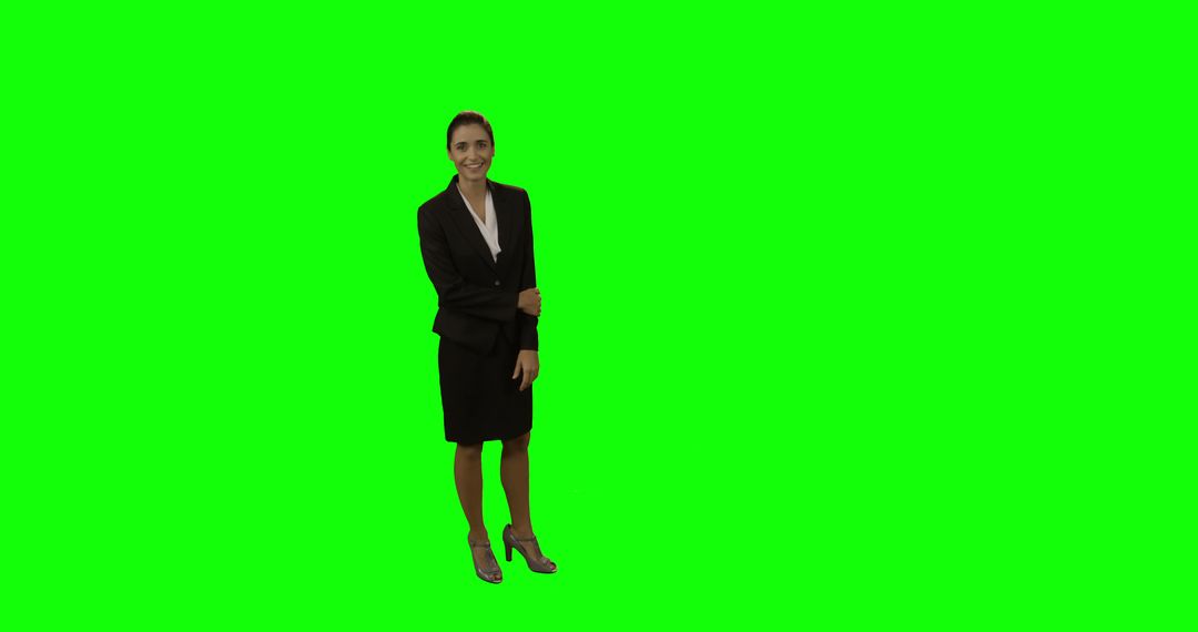 Businesswoman in Formal Attire Posing with Green Background - Free Images, Stock Photos and Pictures on Pikwizard.com