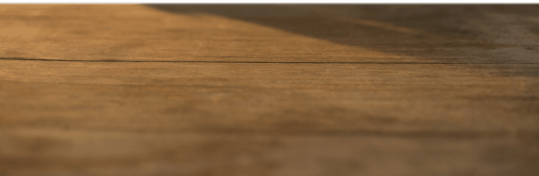 Transparent wooden floor texture with warm lighting