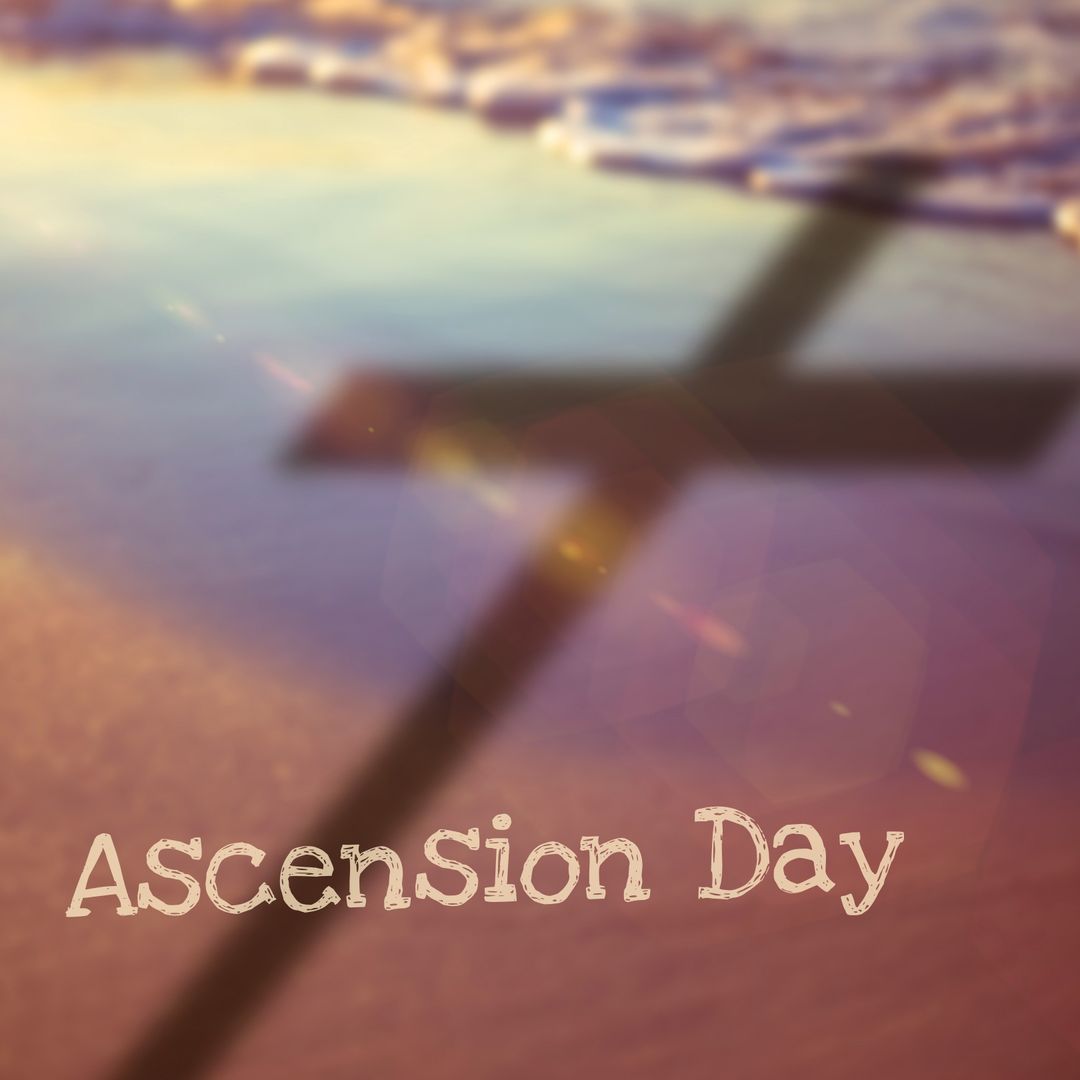 Shadow of Cross on Seashore Symbolizing Ascension Day Celebration