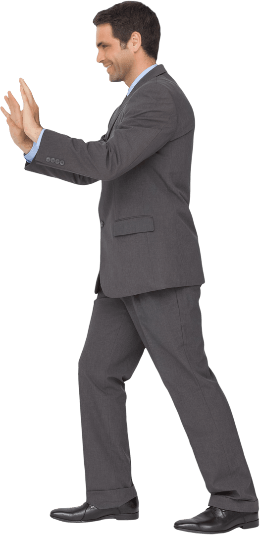 Businessman Pushing Transparent Barrier Concept