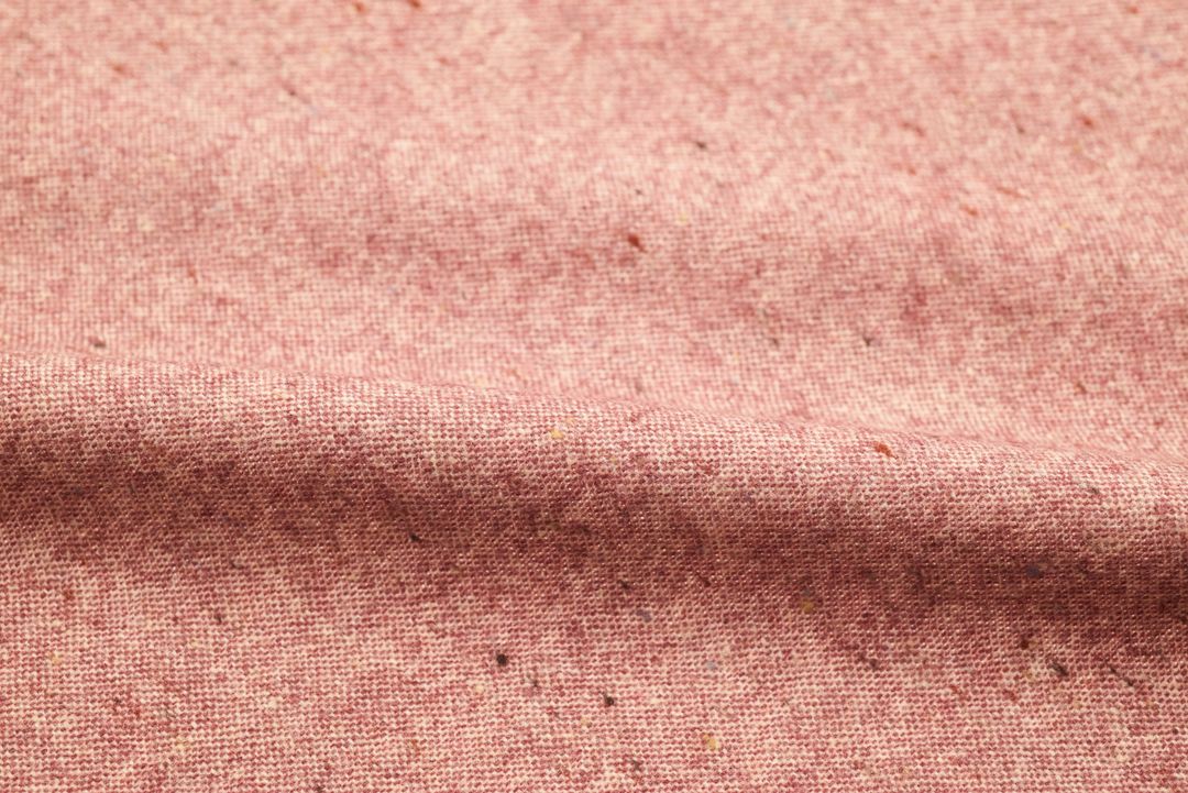 Soft Pink Heathered Fabric Texture Showing Woven Linen Effect with Subtle Flecks
