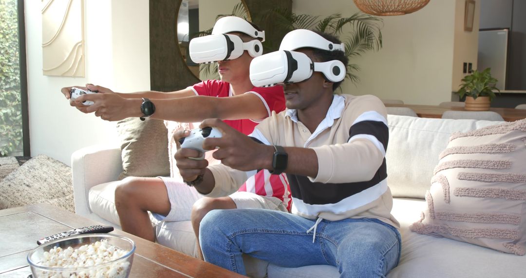 Friends Enjoying VR Gaming at Home with Snacks and Game Controllers