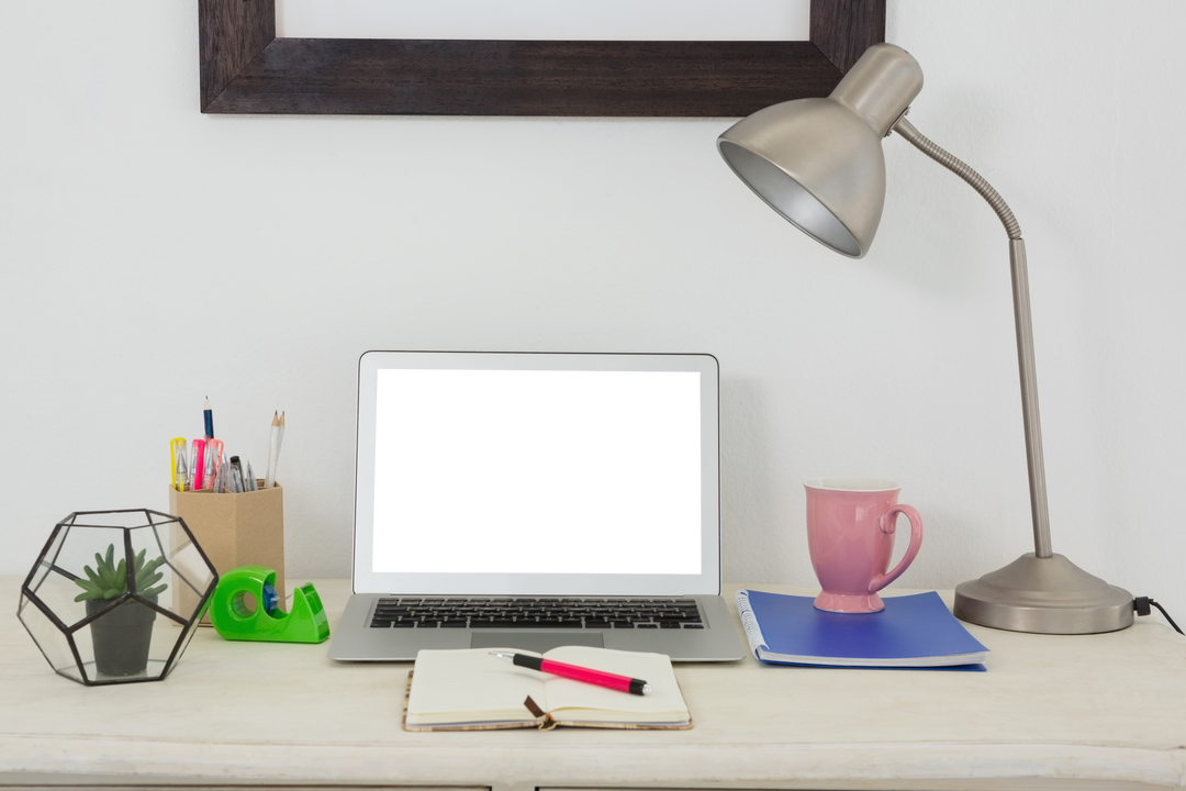 Transparent Screen Laptop with Office Supplies on Desk - Download Free Stock Images Pikwizard.com