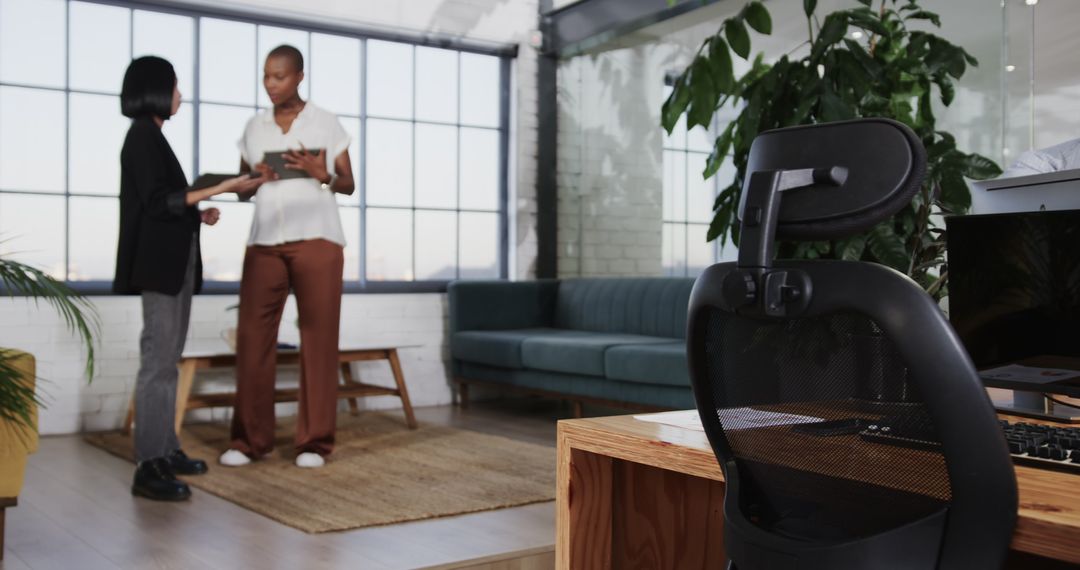 Collaborative Work in Modern Office with Diverse Professionals