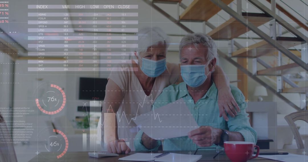 Senior Couple Analyzing Financial Data at Home During Pandemic