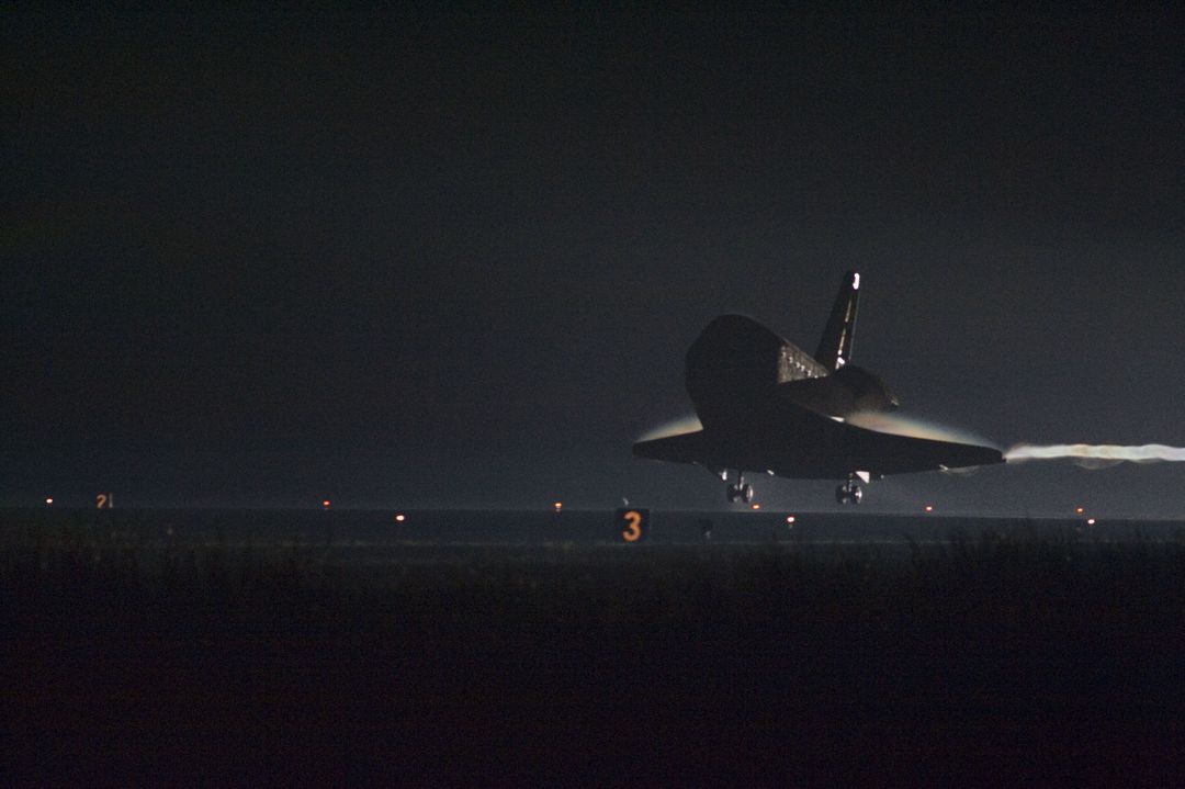 Space shuttle Endeavour makes its final landing at night - Free Images, Stock Photos and Pictures on Pikwizard.com