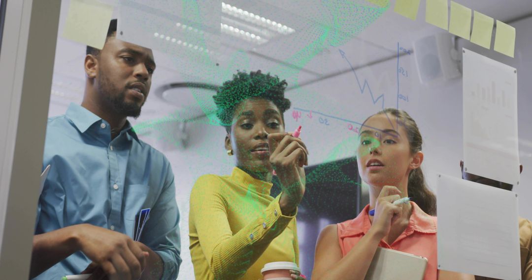 Diverse Team Collaborating in Office with Whiteboard Brainstorming