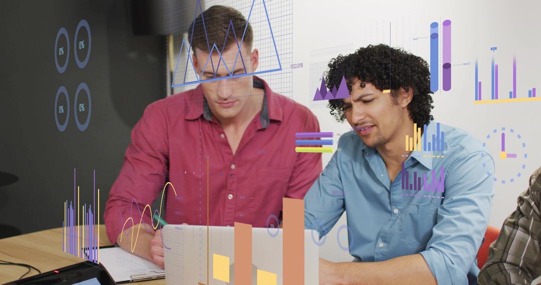 Collaborating Analysts Reviewing Data Visualizations on Laptop for Team Strategy and Growth