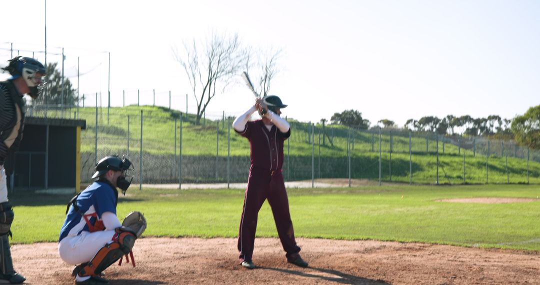 Baseball Game in Full Swing on Scenic Field