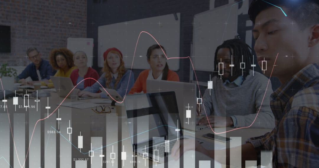 Diverse Team Analyzing Financial Data with Laptops and Charts