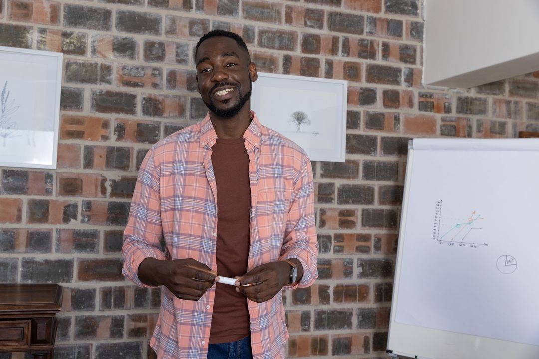 Confident Professional Presenting Line Graph in Modern Office