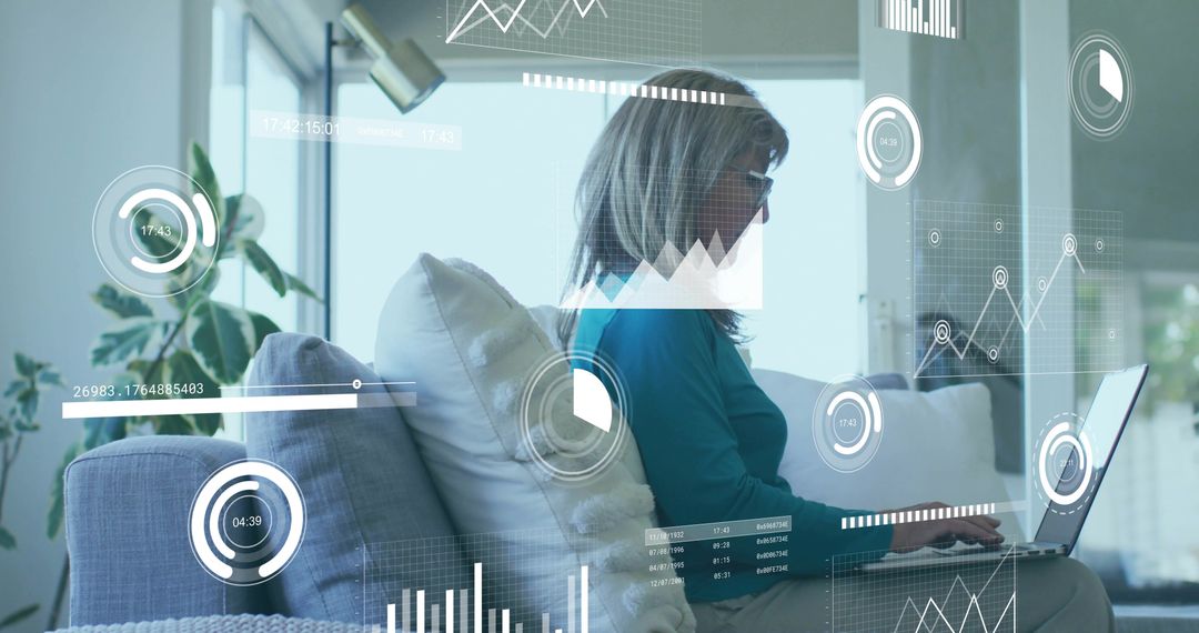 Senior Woman Analyzing Data on Laptop with Digital Chart Overlays in Living Room