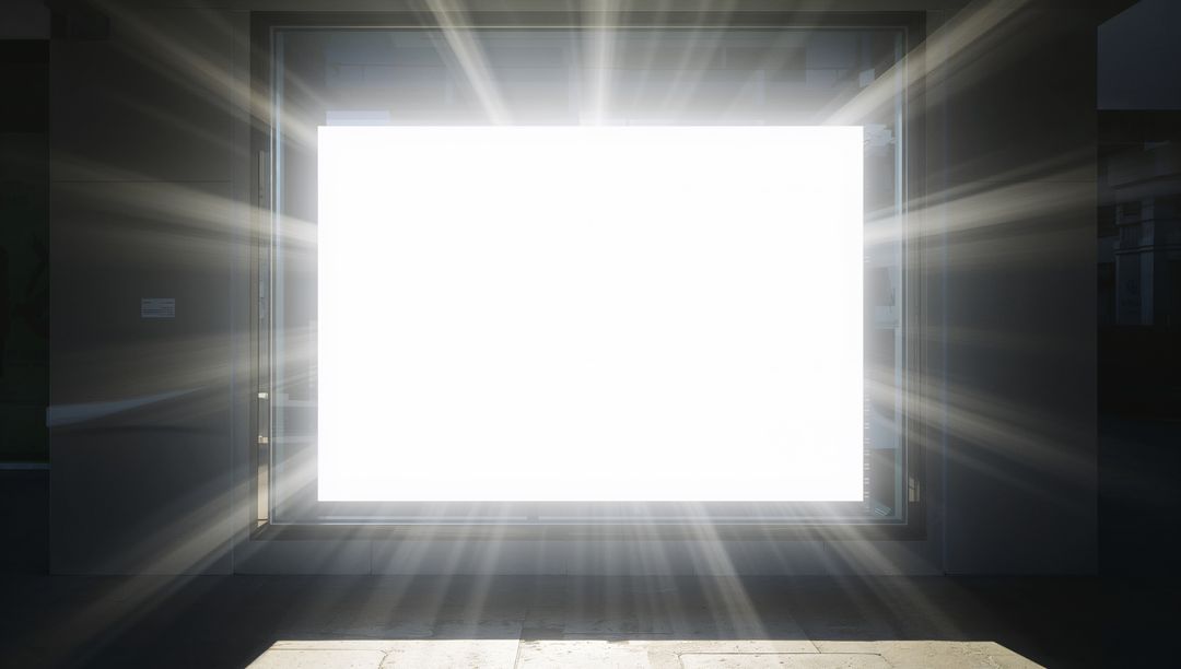 Rectangular Light Portal Emitting Radiant Beams in Dark Gallery Entrance with Symmetry