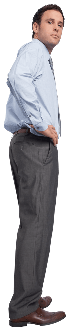 Serious Businessman Standing with Hand on Hip on Transparent Background