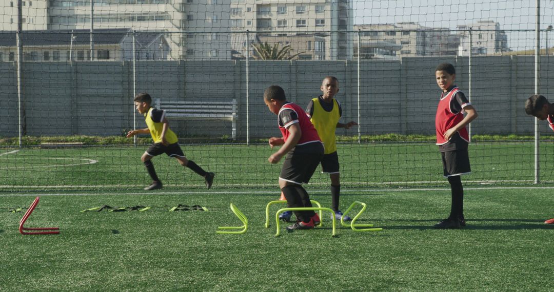 Youth Soccer Team Training on Field with Agility Drills - Free Images, Stock Photos and Pictures on Pikwizard.com