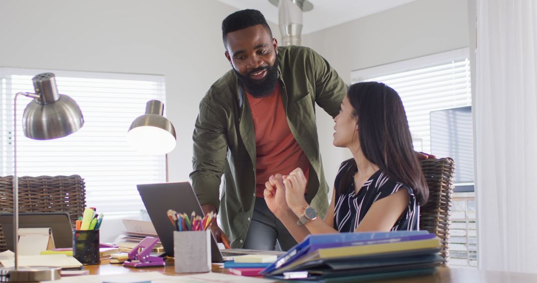 Diverse Colleagues Collaborating in Home Office Environment