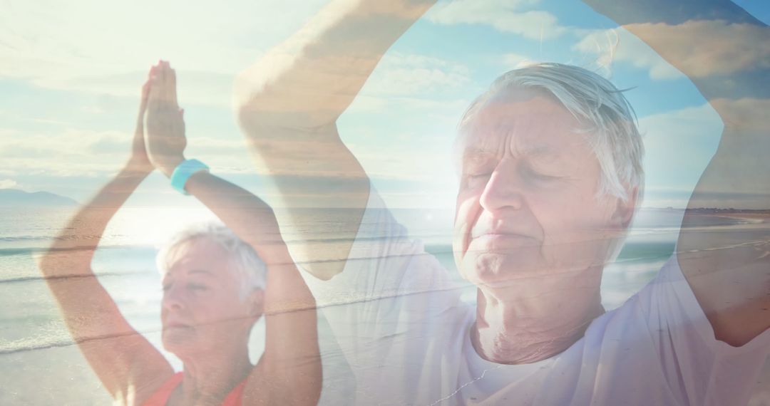 Senior Couple Practicing Yoga By Seaside with Glowing Light Overlay