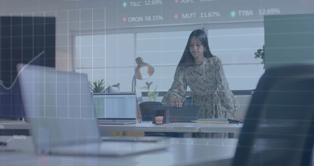 Businesswoman Analyzing Financial Data with Digital Screen Projection