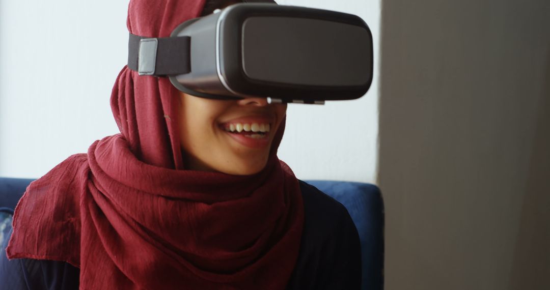 Young Woman in Hijab Experiencing Virtual Reality - Free Images, Stock Photos and Pictures on Pikwizard.com