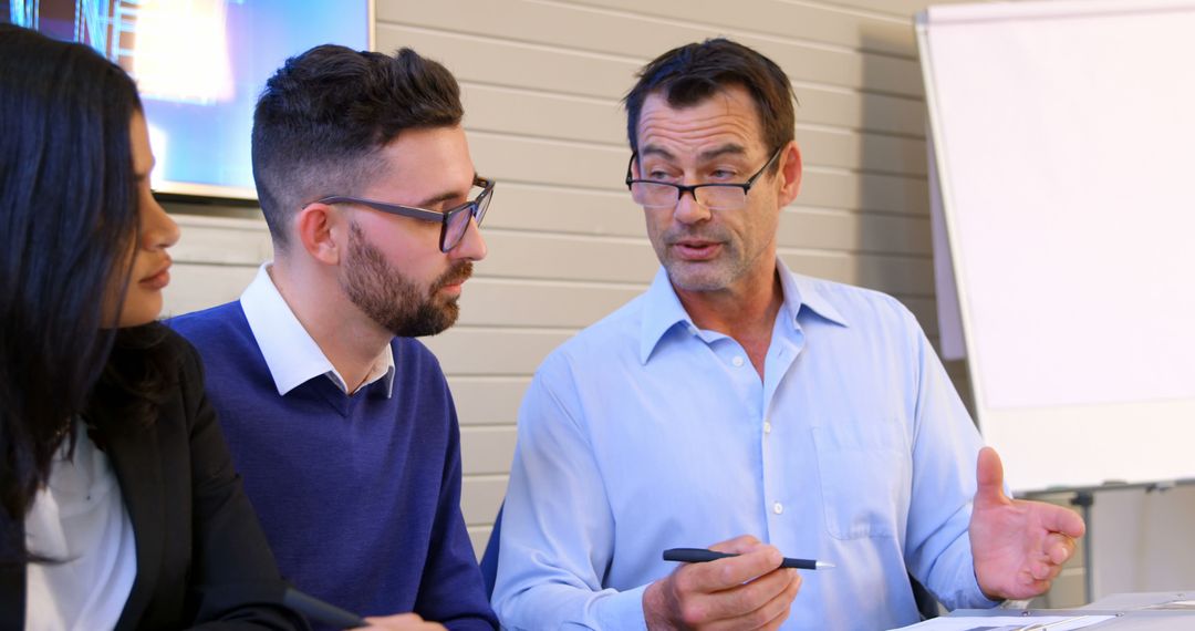 Diverse Colleagues Engaged in Professional Discussion with Copy Space