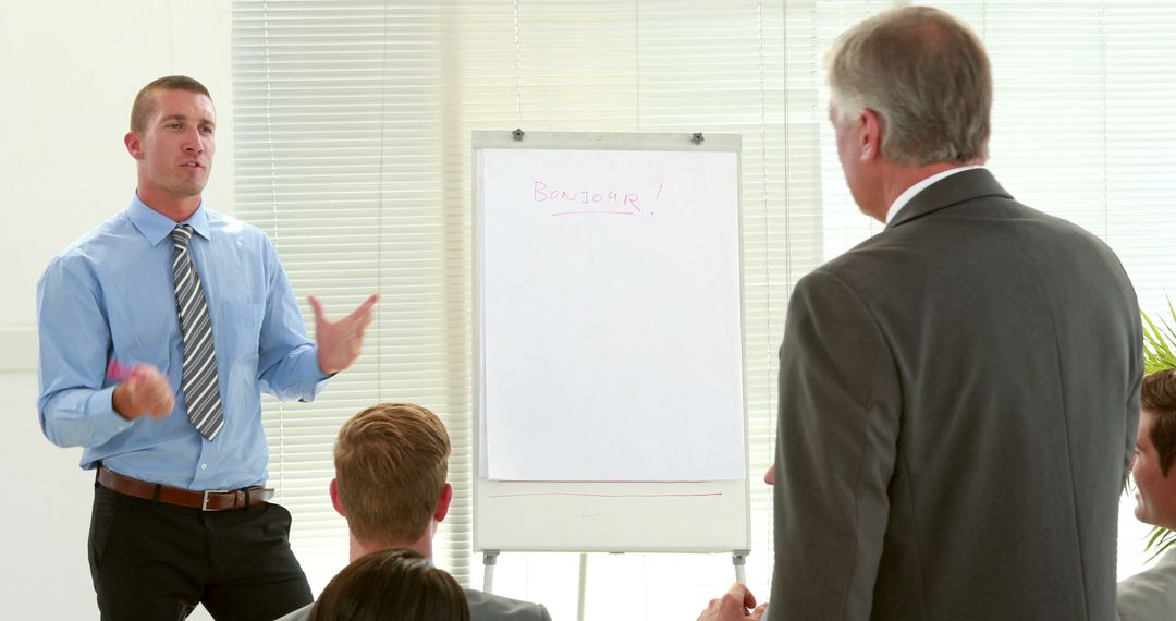 Business meeting with presentation and flipchart - Free Images, Stock Photos and Pictures on Pikwizard.com