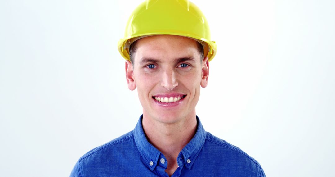 Smiling Male Construction Worker Wearing Safety Helmet - Free Images, Stock Photos and Pictures on Pikwizard.com