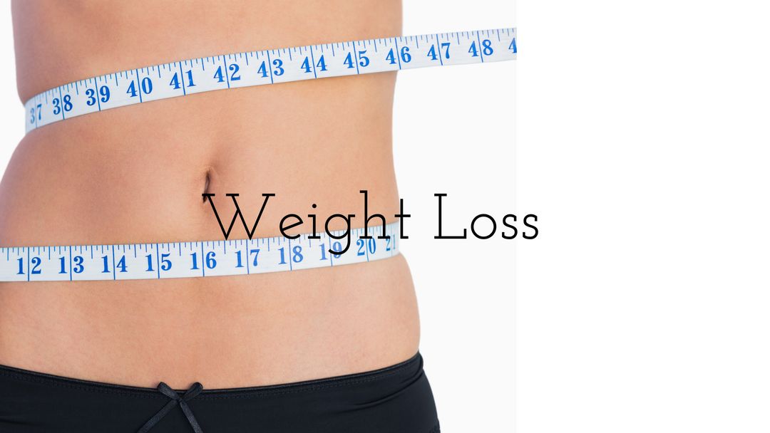Successful Weight Loss with Measuring Tape on Slim Waist