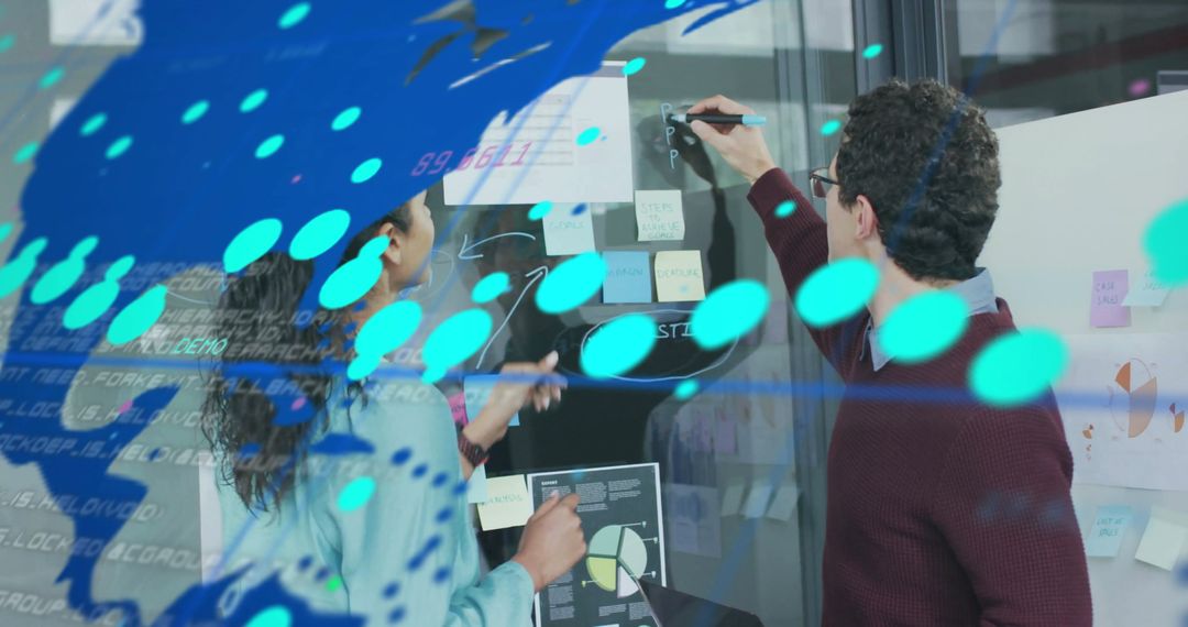 Business Professionals Collaborating with Financial Data Visualizations