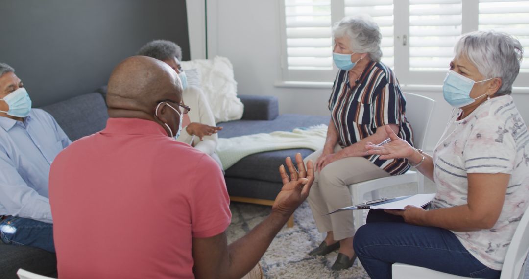 Senior Adults Participating in Group Therapy Session Wearing Face Masks - Free Images, Stock Photos and Pictures on Pikwizard.com