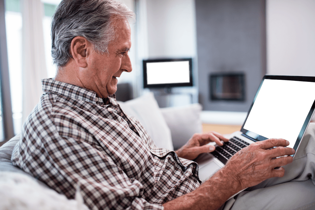 Transparent Scene: Senior Man Relaxed Using Laptop on Sofa